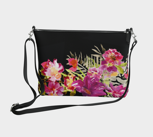 Black floral crossbody. Beautiful pink and coral flowers  with a crossbody straw.