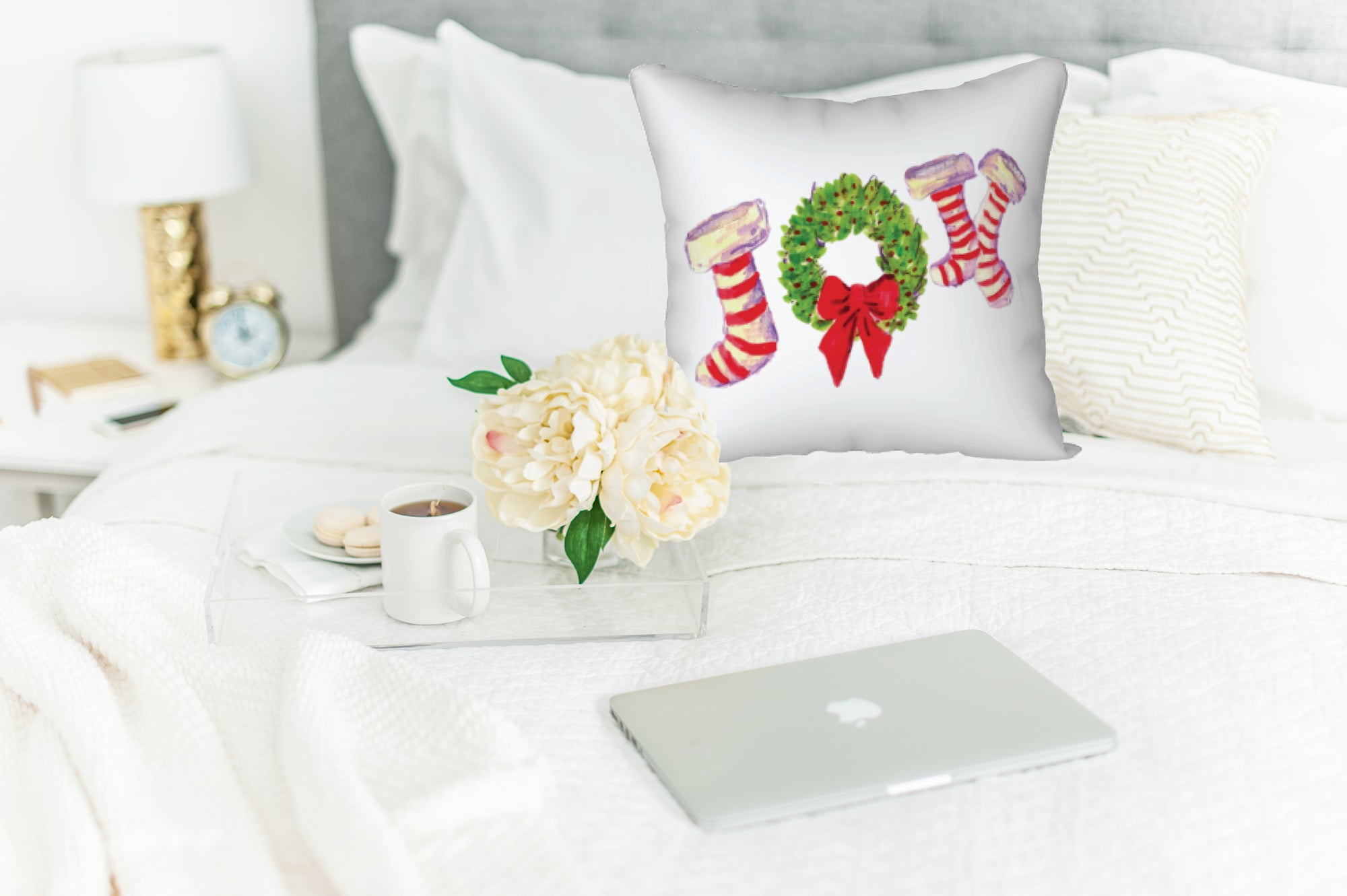 Joy to the World with this festive Joy Pillow. Watercolor image printed onto this square pillow. Will add a pop of festivity to any Christmas Holiday. There is a wreath painted in the middle of the two stocking letters to create the word JOY. White background with red and white striped stockings.