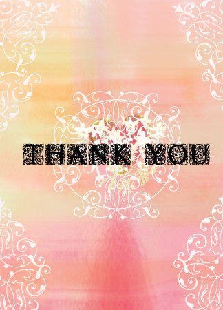a gradient of pink and peach on the background. White lacey embellisments adorn the corners and in the center of the card. Thank you appears in a black font with fancy block embellishments
